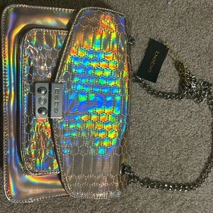 Shiny Bebe purse. New with tags! Perfect for a night out!